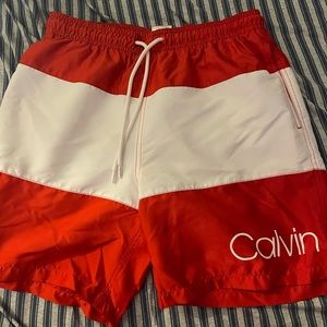 Calvin Klein swim shorts.